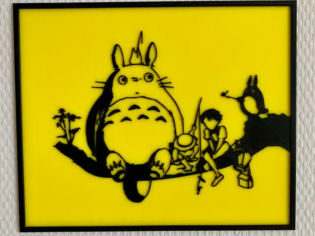 Totoro sitting on a tree