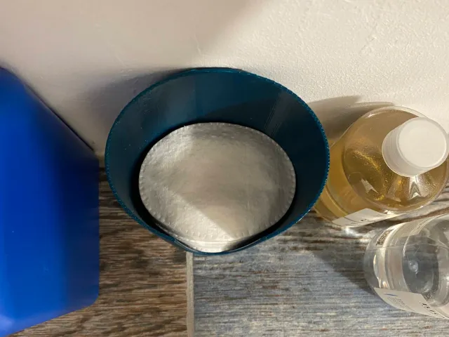 Dispenser for oval cotton pads