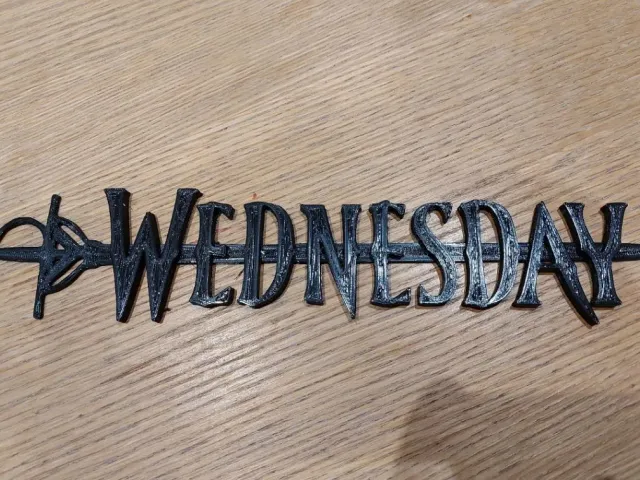 Wednesday Addams sign logo with rapier