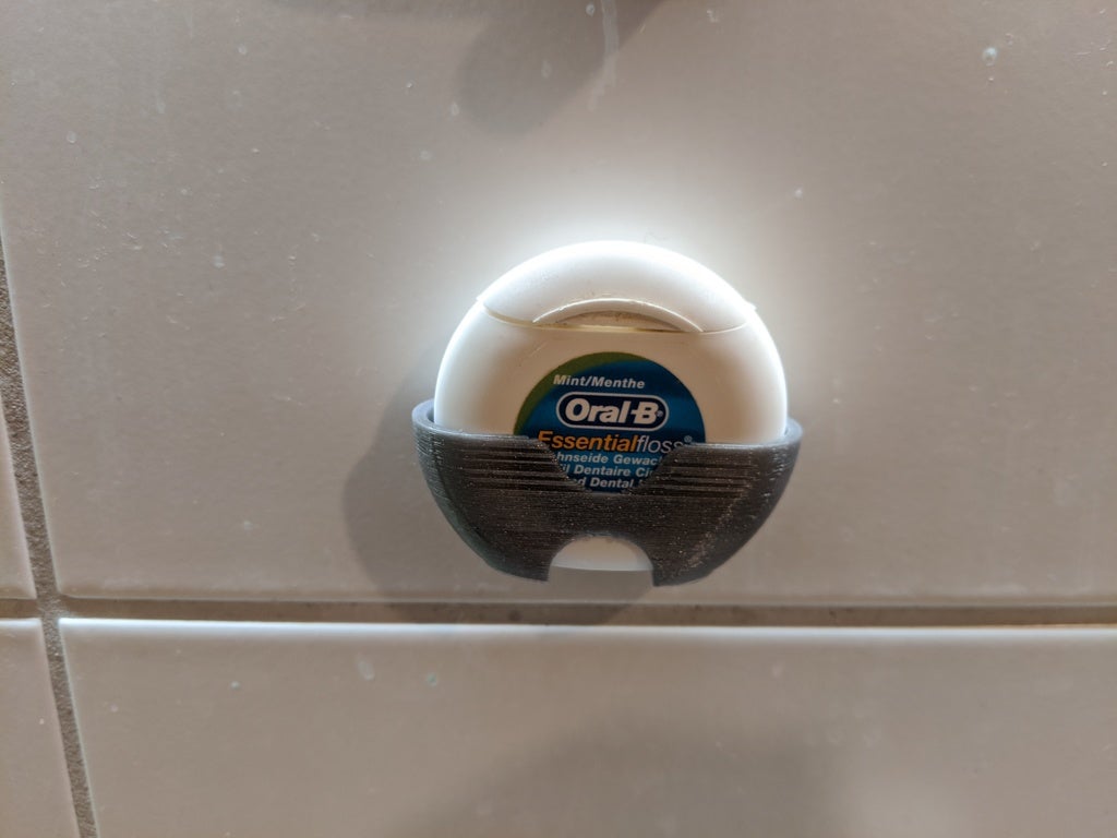 Wall mount for OralB Essential Floss