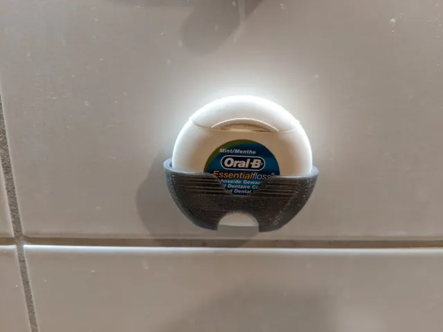 Wall mount for OralB Essential Floss