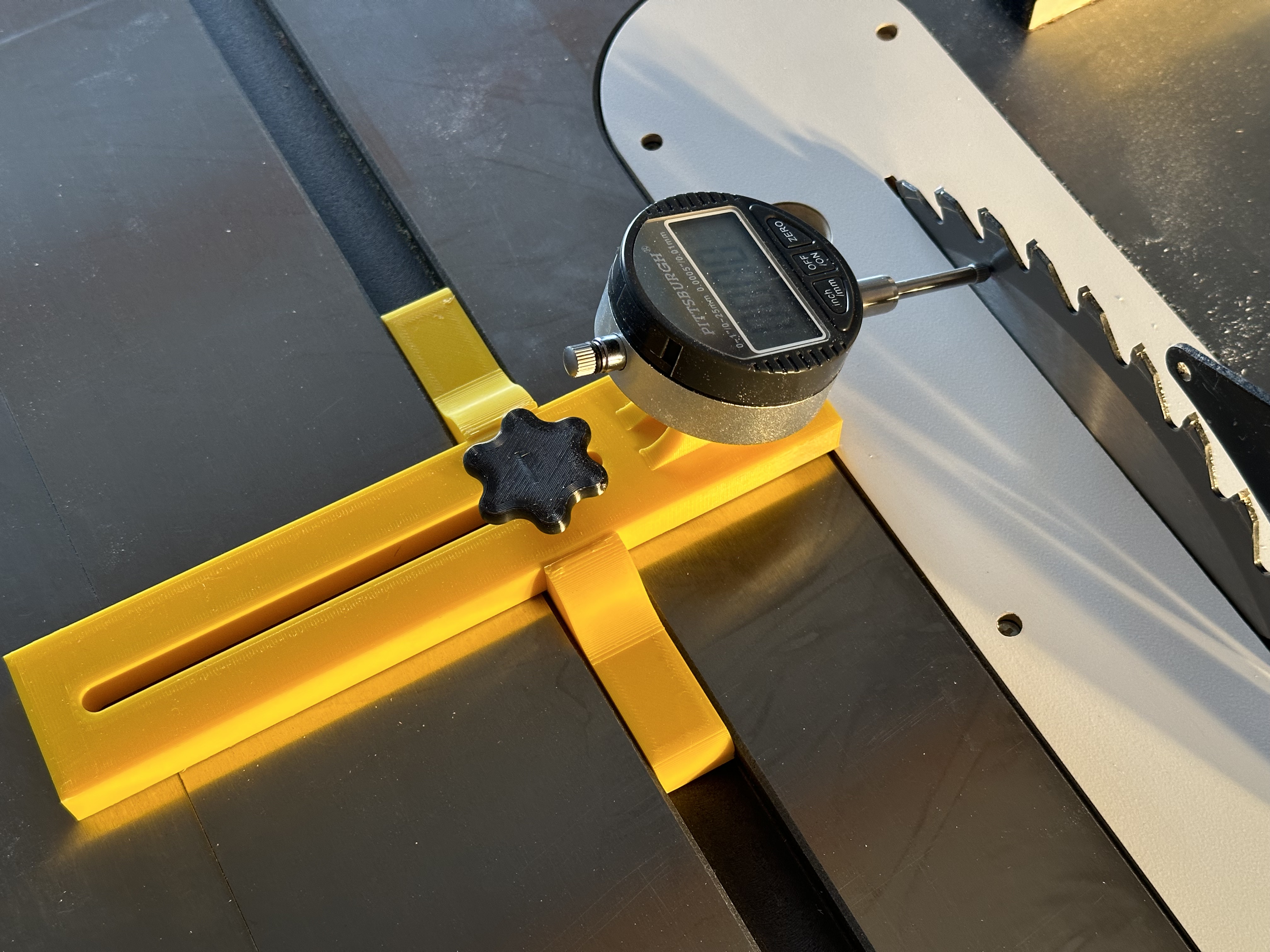 Jig to hold indicator for aligning table saw