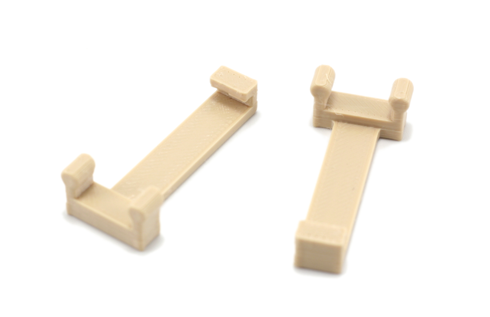 Race track guardrail holder
