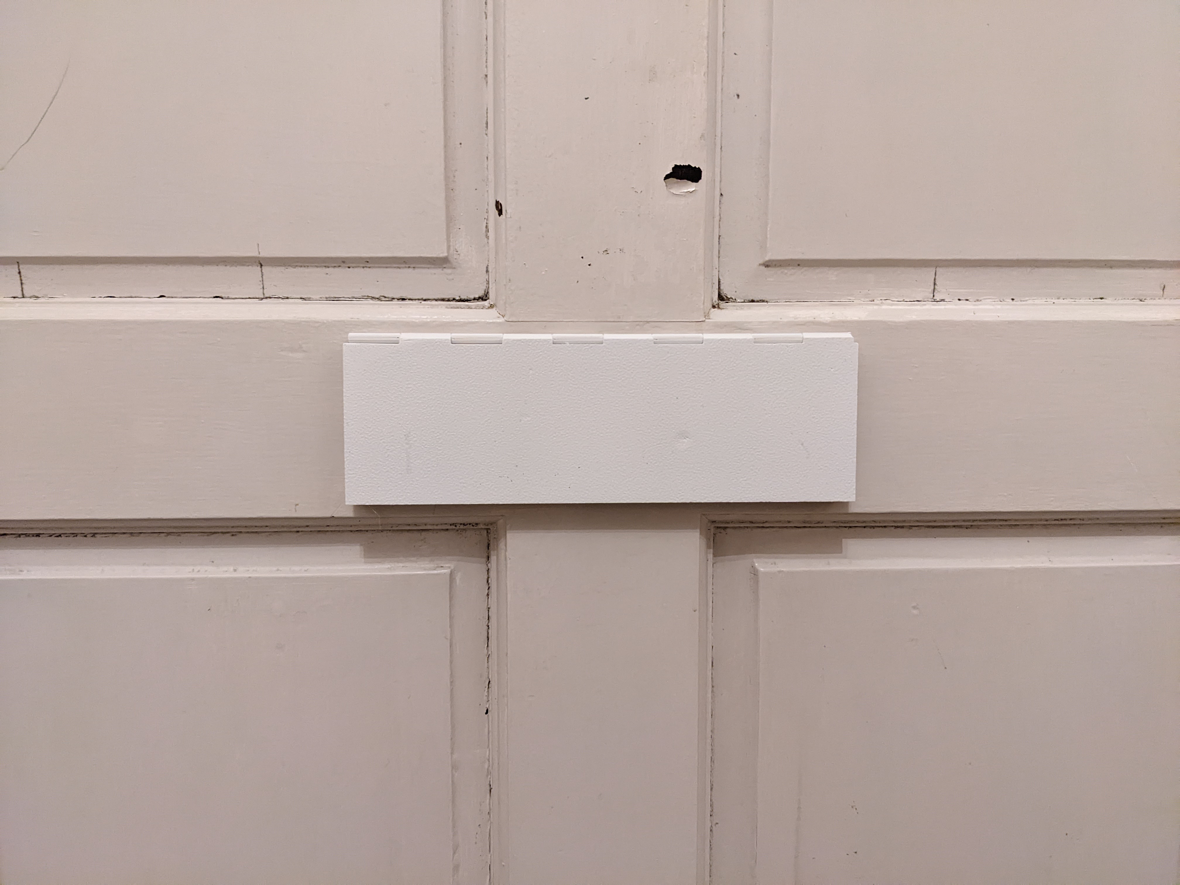 Customisable magnetic letter box draft excluder