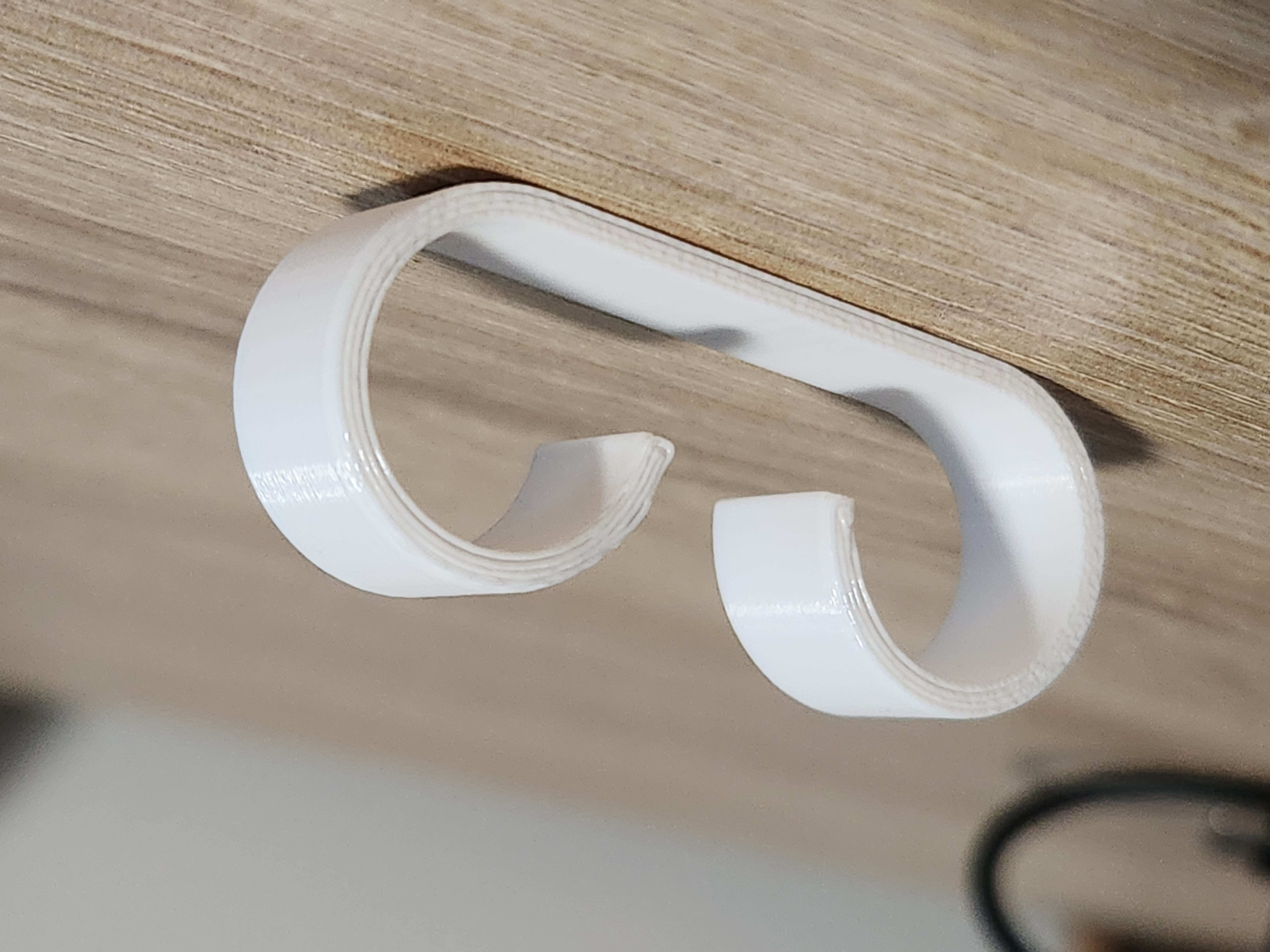 Modern simplistic cable holder