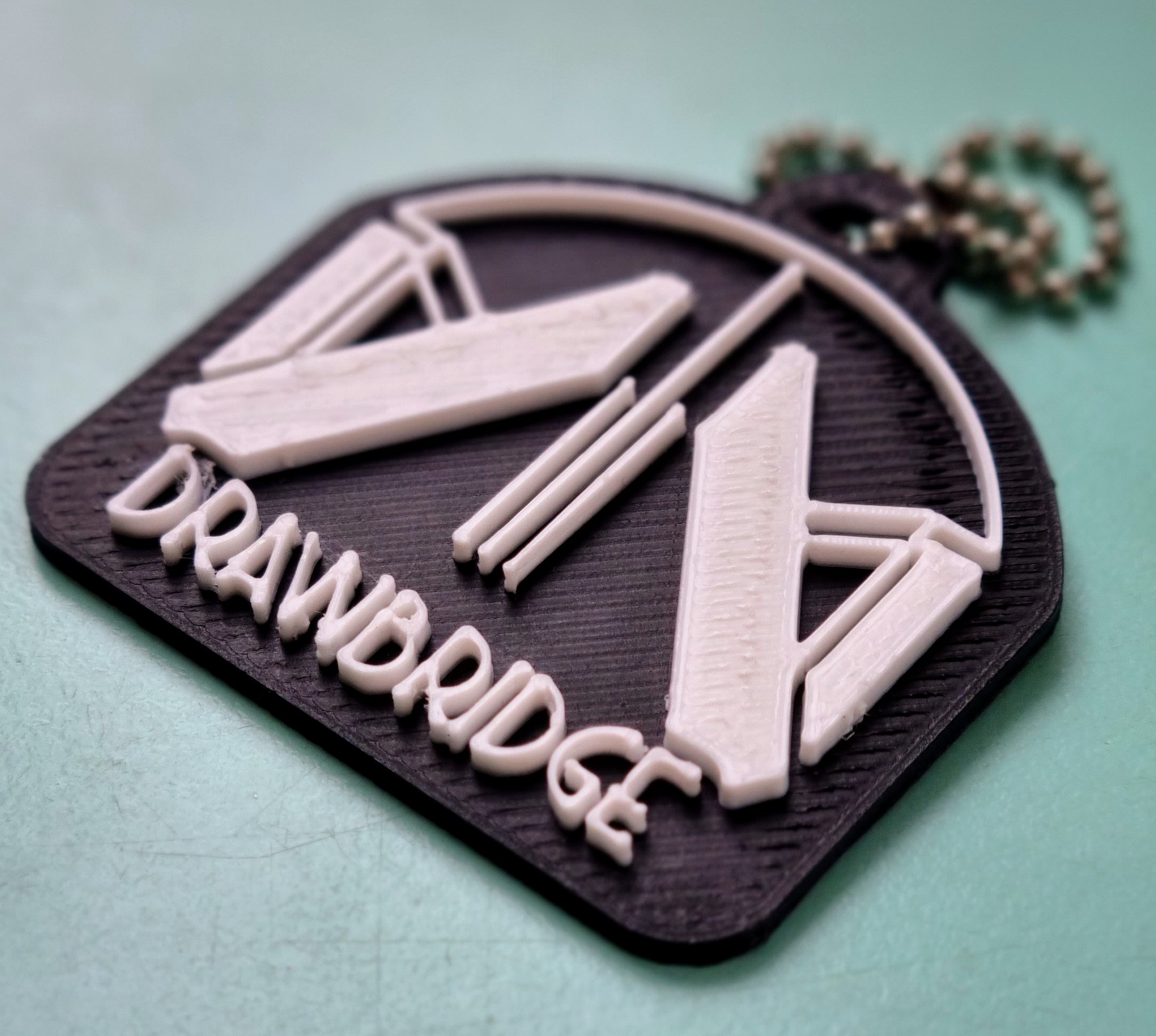Death Stranding 2 Drawbridge Logo Keychain