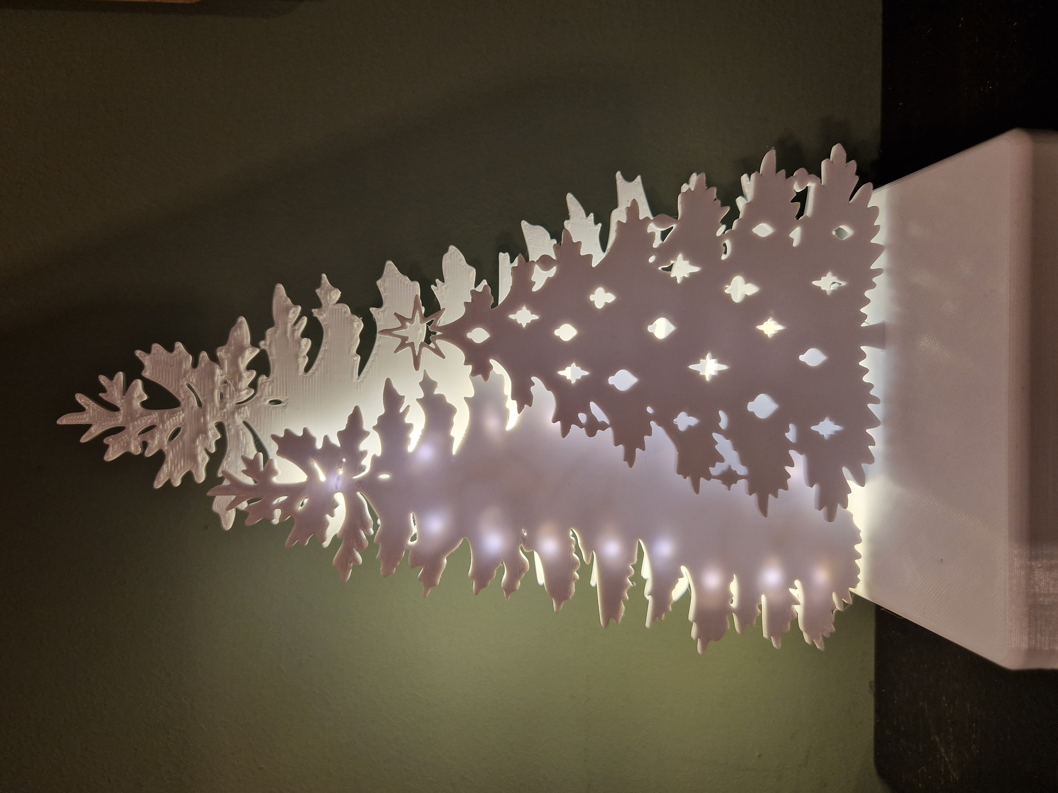 Three Christmas Trees with LED string decoration