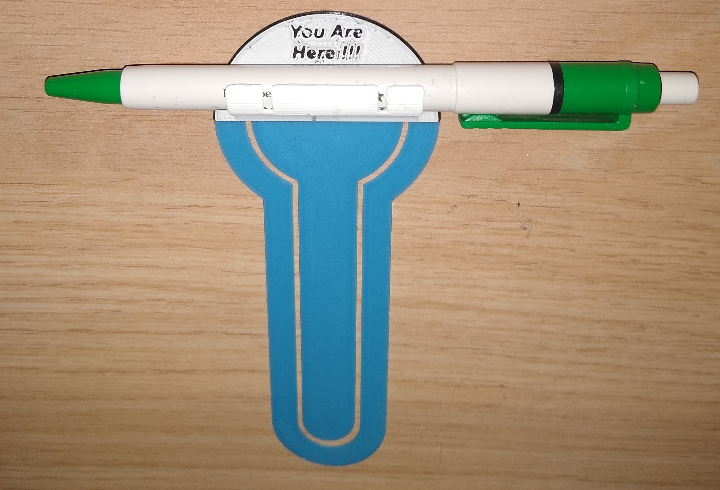 Book marker with pen holder