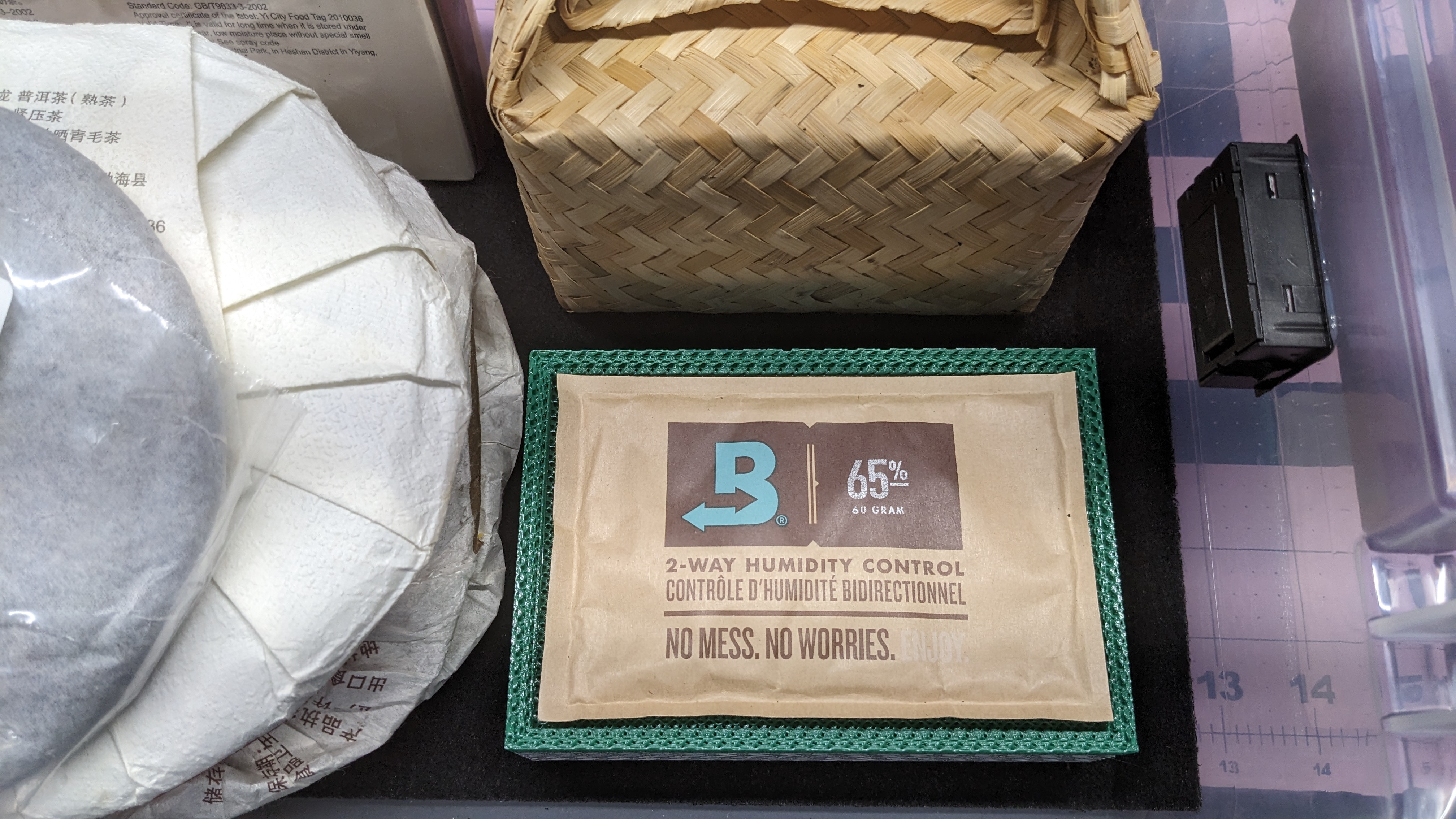 Stackable humidity control pack holder for Boveda style packs
