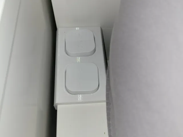 Holder for Tradfri switches for Malm bed