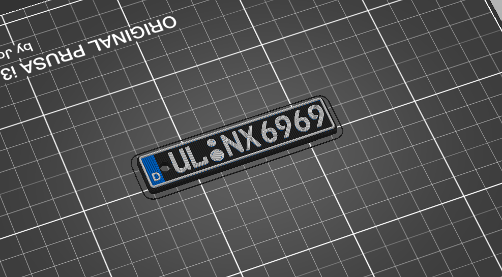 Vehicle number plate keyring.