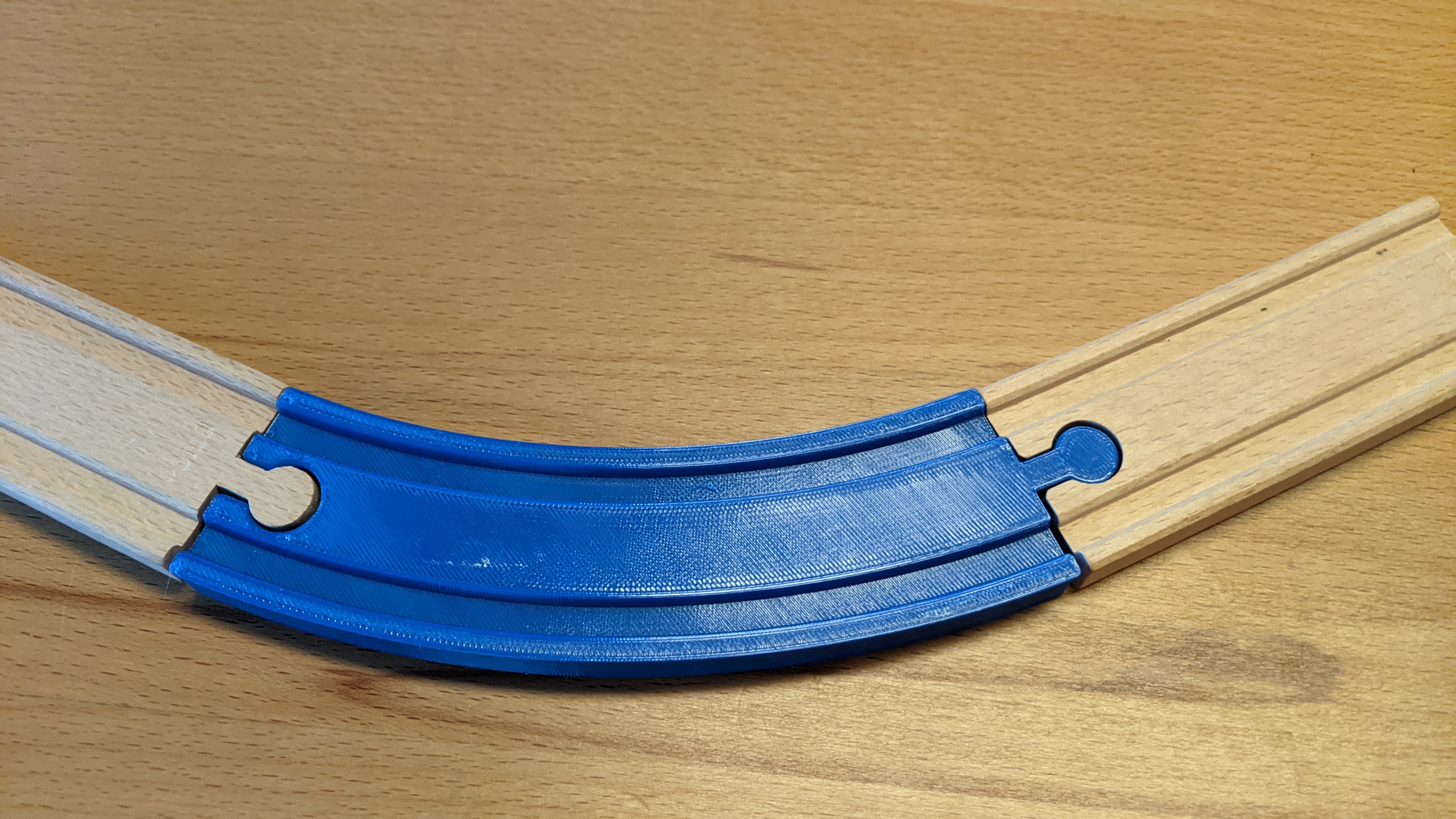 Curved rail (suitable Brio).