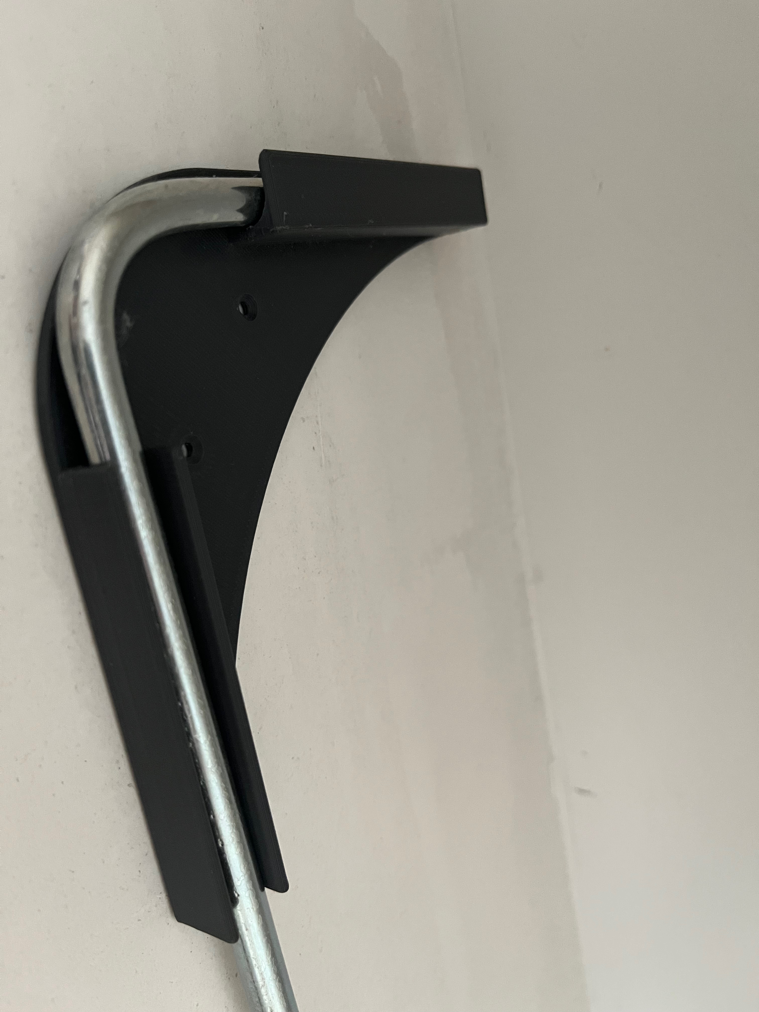 Holder for attic stair key bar