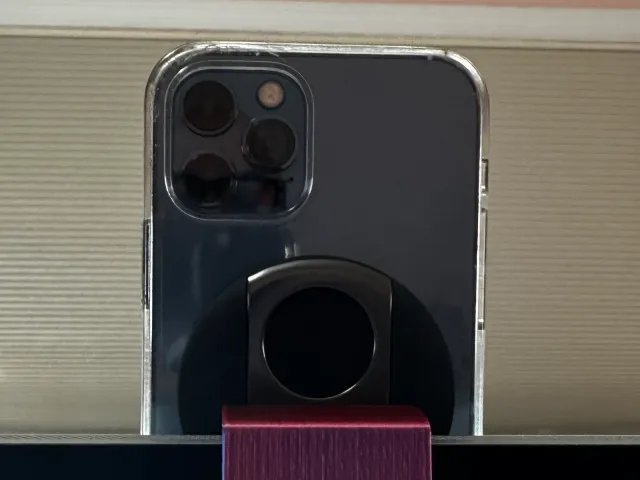 Shim for a Belkin Continuity Camera Mount to use on an Apple Studio Display