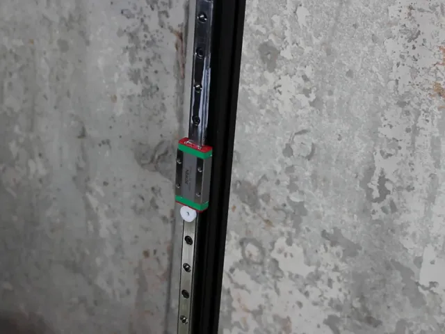 Linear rail carriage stop