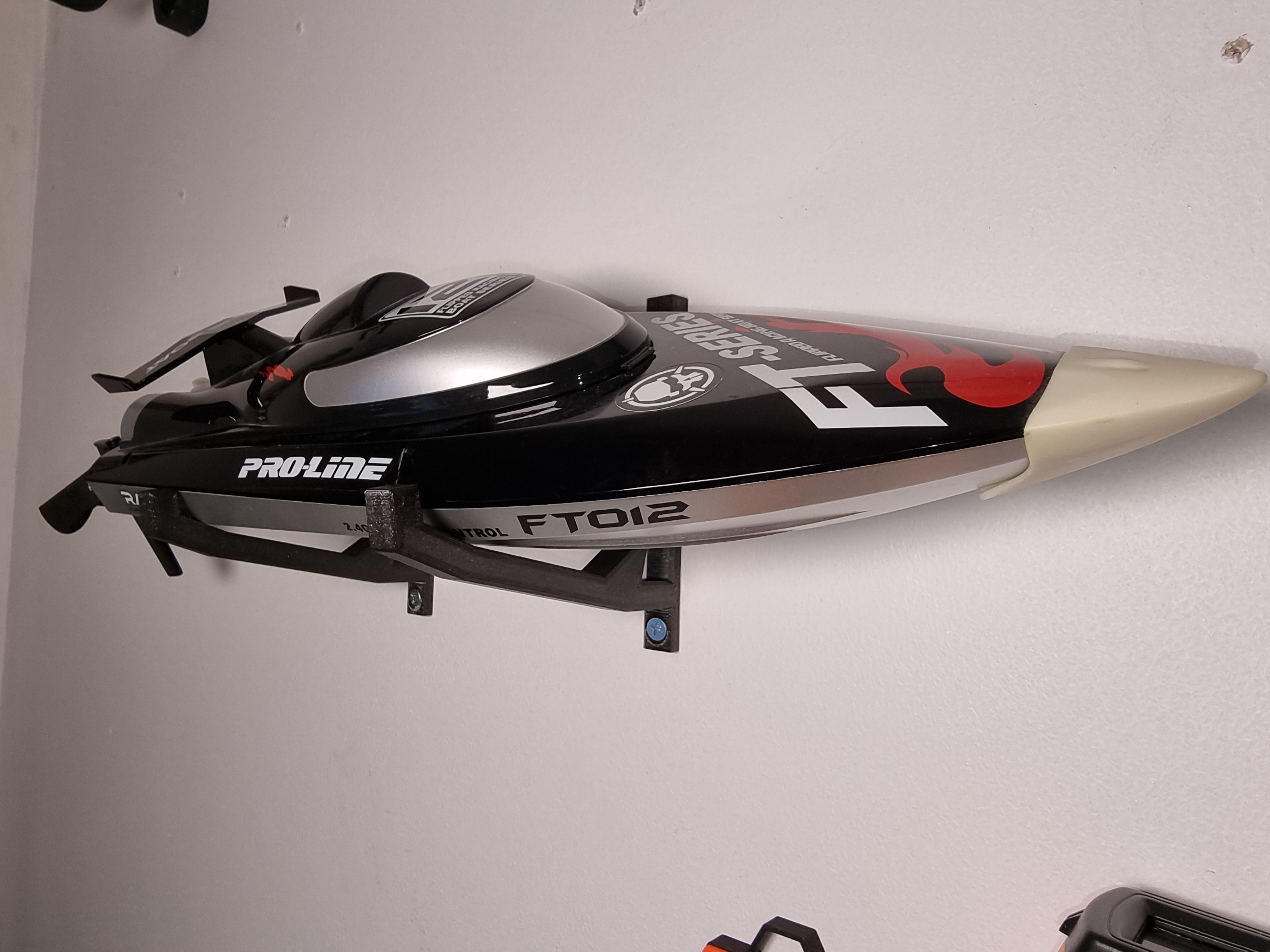 Wall mounted shelf for RC boat