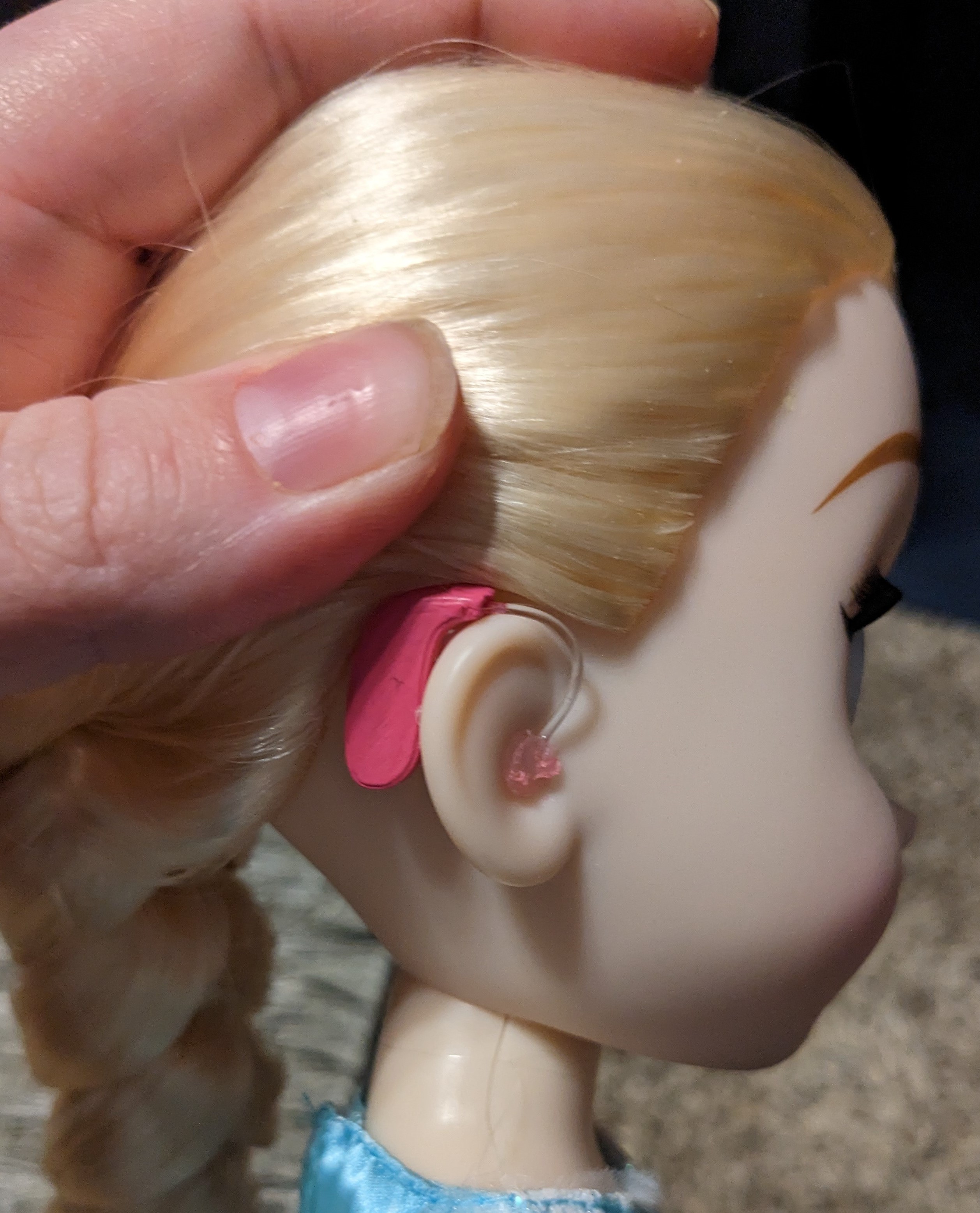 Doll sized hearing aid