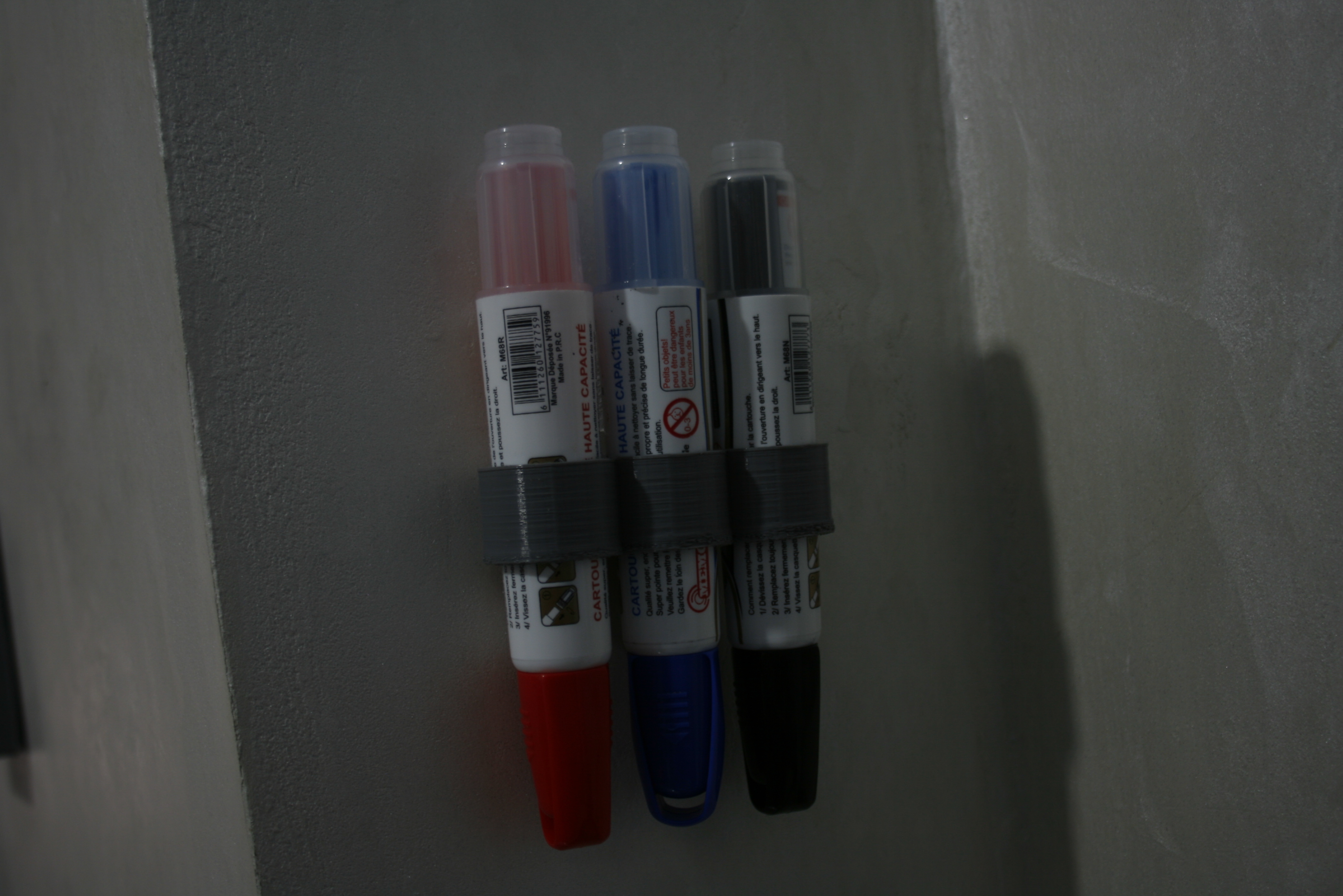 Whiteboard marker holder