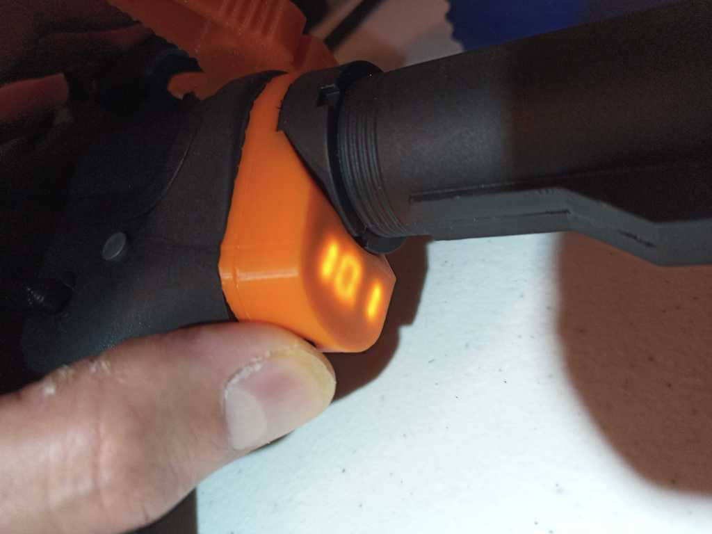 Airsoft M4 AEG stock spacer with volt meter