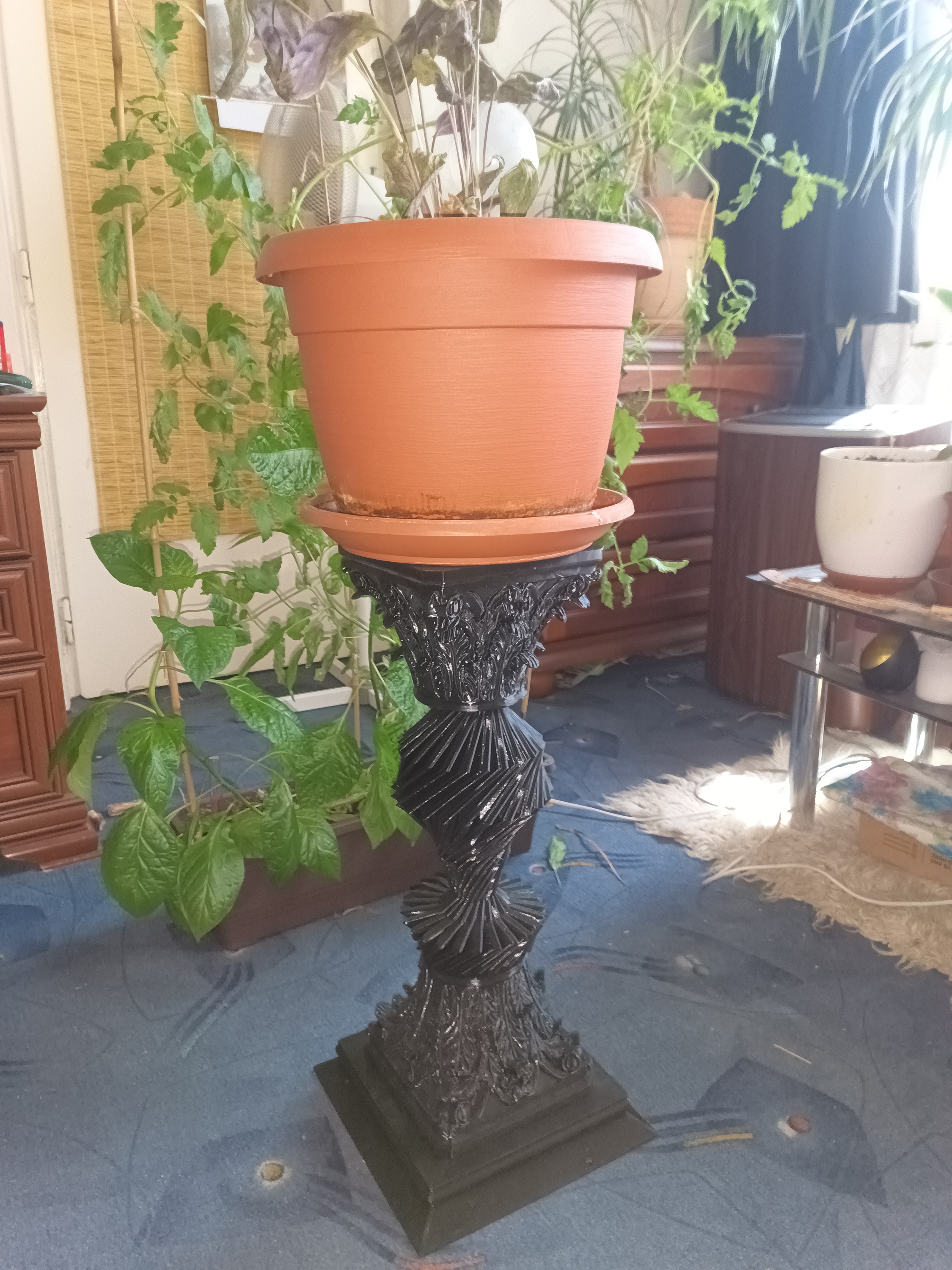 Stand for a flower pot.