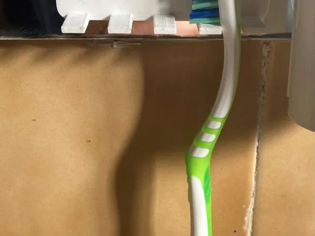 Pratical toothbrush suction cup holder