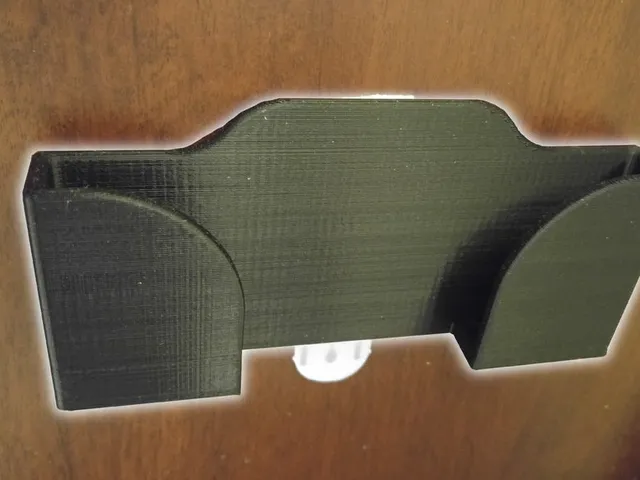 Wall-mounted Kindle Holder