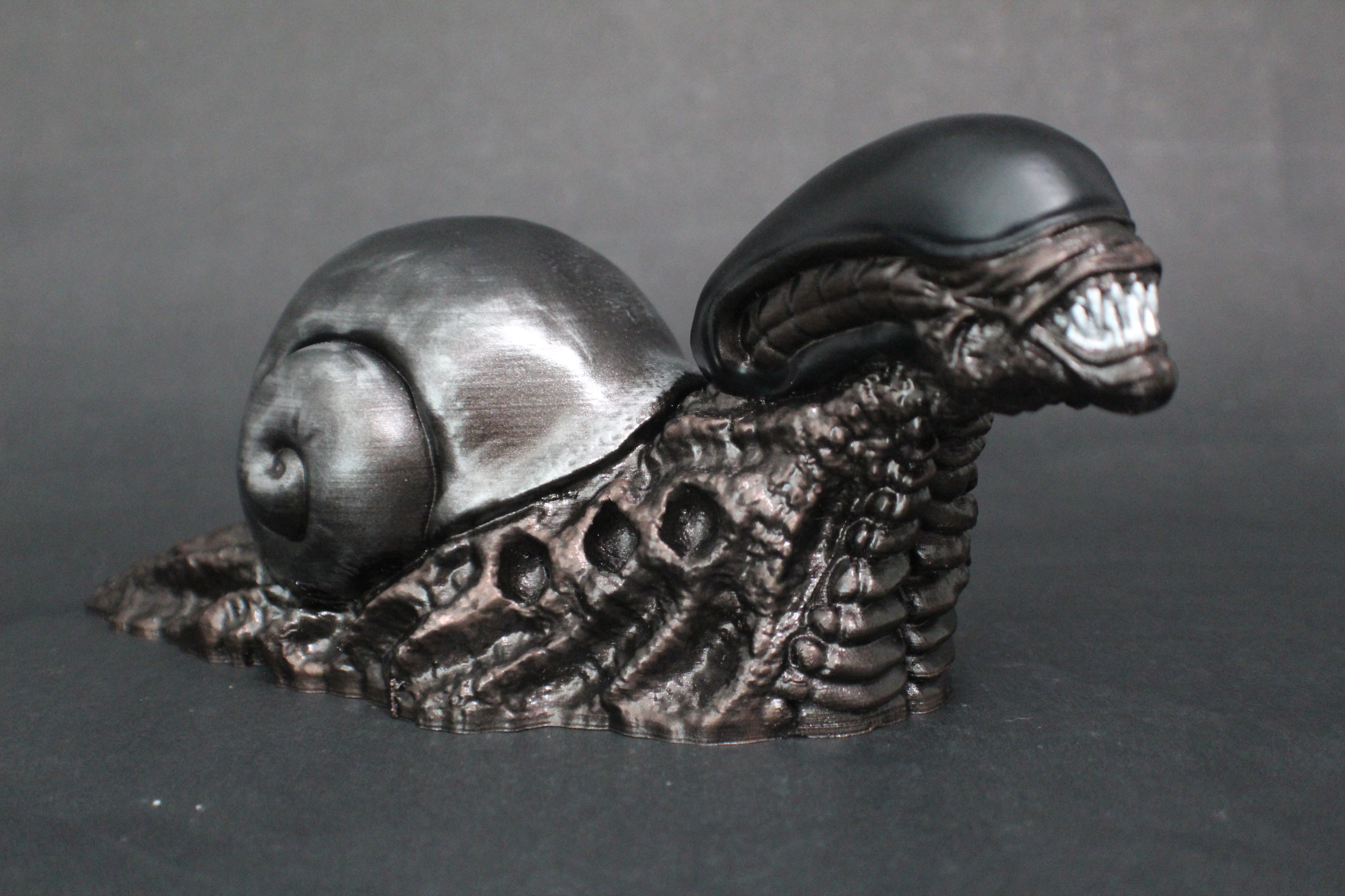 Snailien (snail-alien xenomorph mashup) lawn ornament