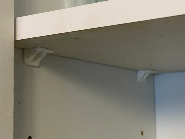 Shelf bracket pin