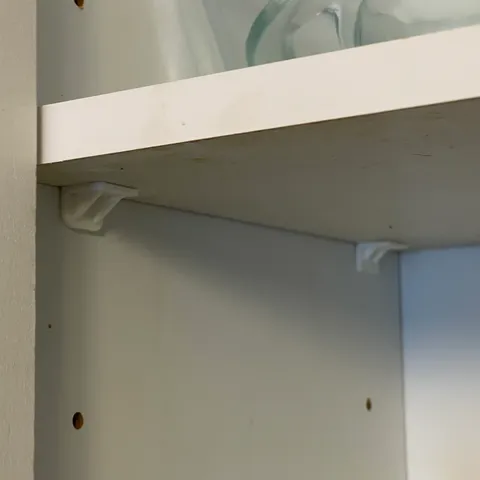 Shelf bracket pin