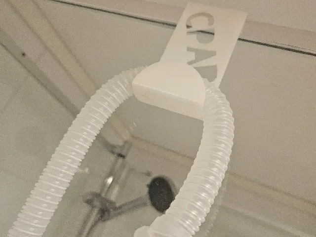 CPAP hose shower holder