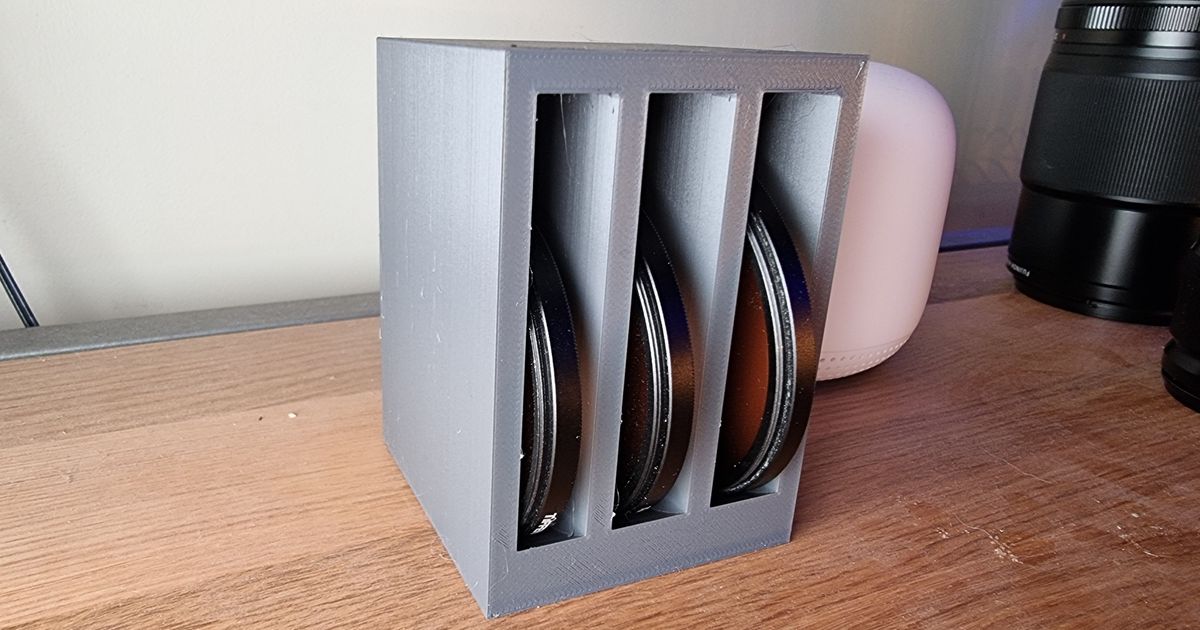 Camera lens filter holder by Alex BrookeSmith Download free STL