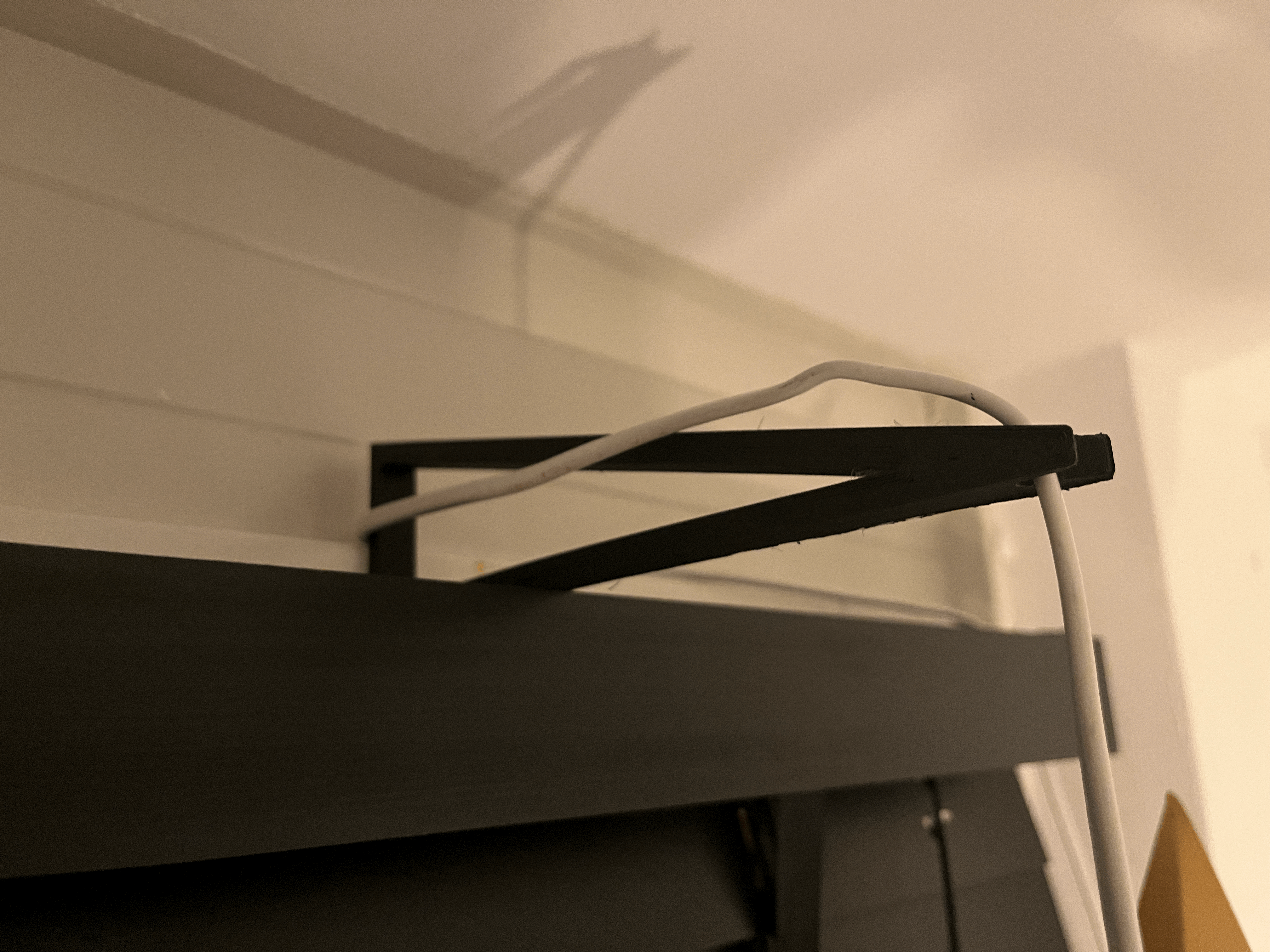 Bracket for hanging Christmas star on window shutters