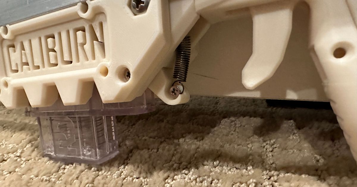 Short Wide Mag Release for Passive Magwell Caliburn by racerethan