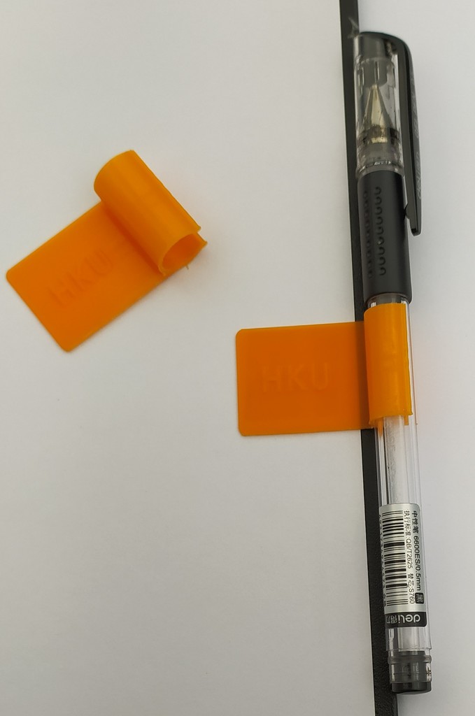 Notebook pen holder