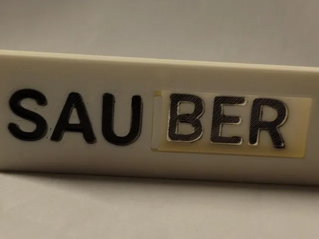 Clean-Dirty-Sign for dishwashers; SAUBER- bzw. SAUIG-Schild für Spülmaschinen