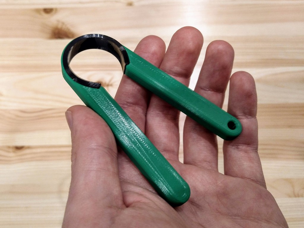 Brushless motor bell holder/wrench for prop removal