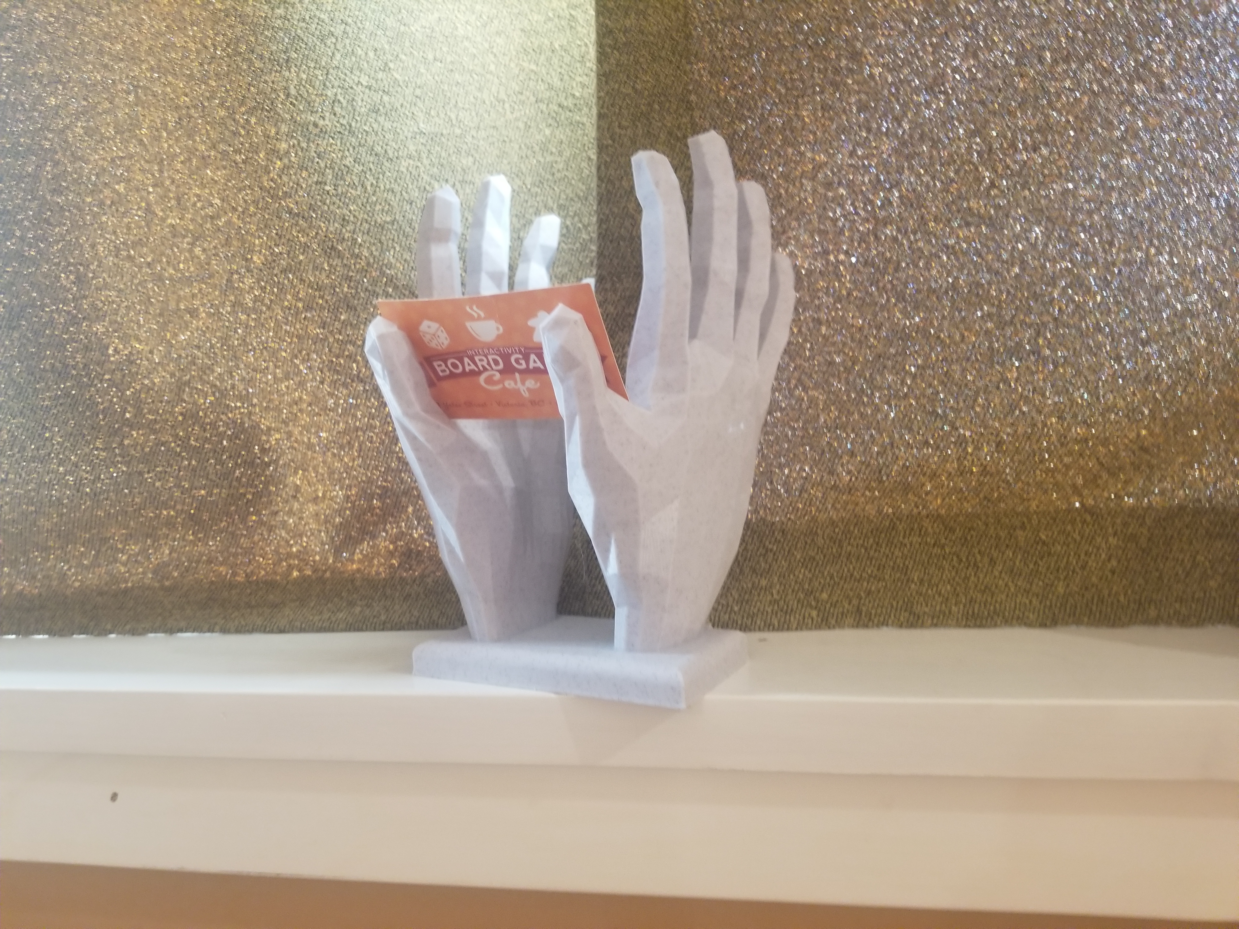 Business card hand stand