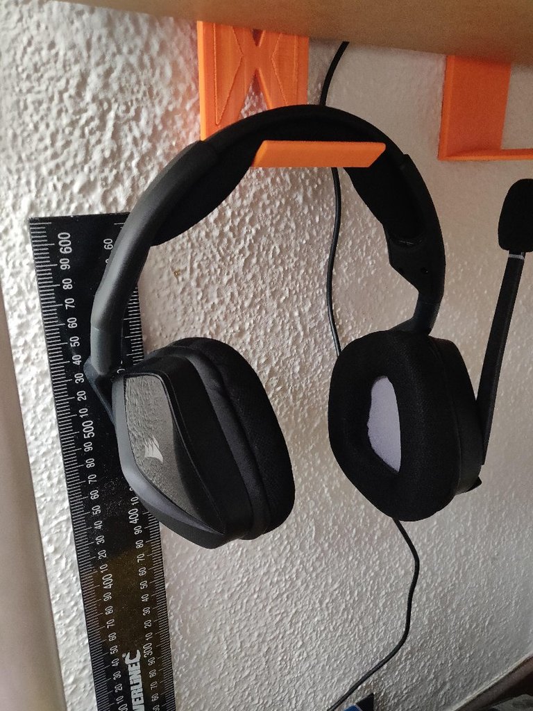 Headphones under table hook