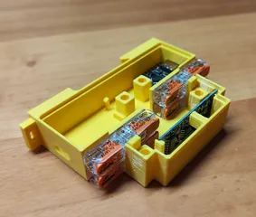 Parametric DIN rail enclosure for small ESP32 modules (cadquery)
