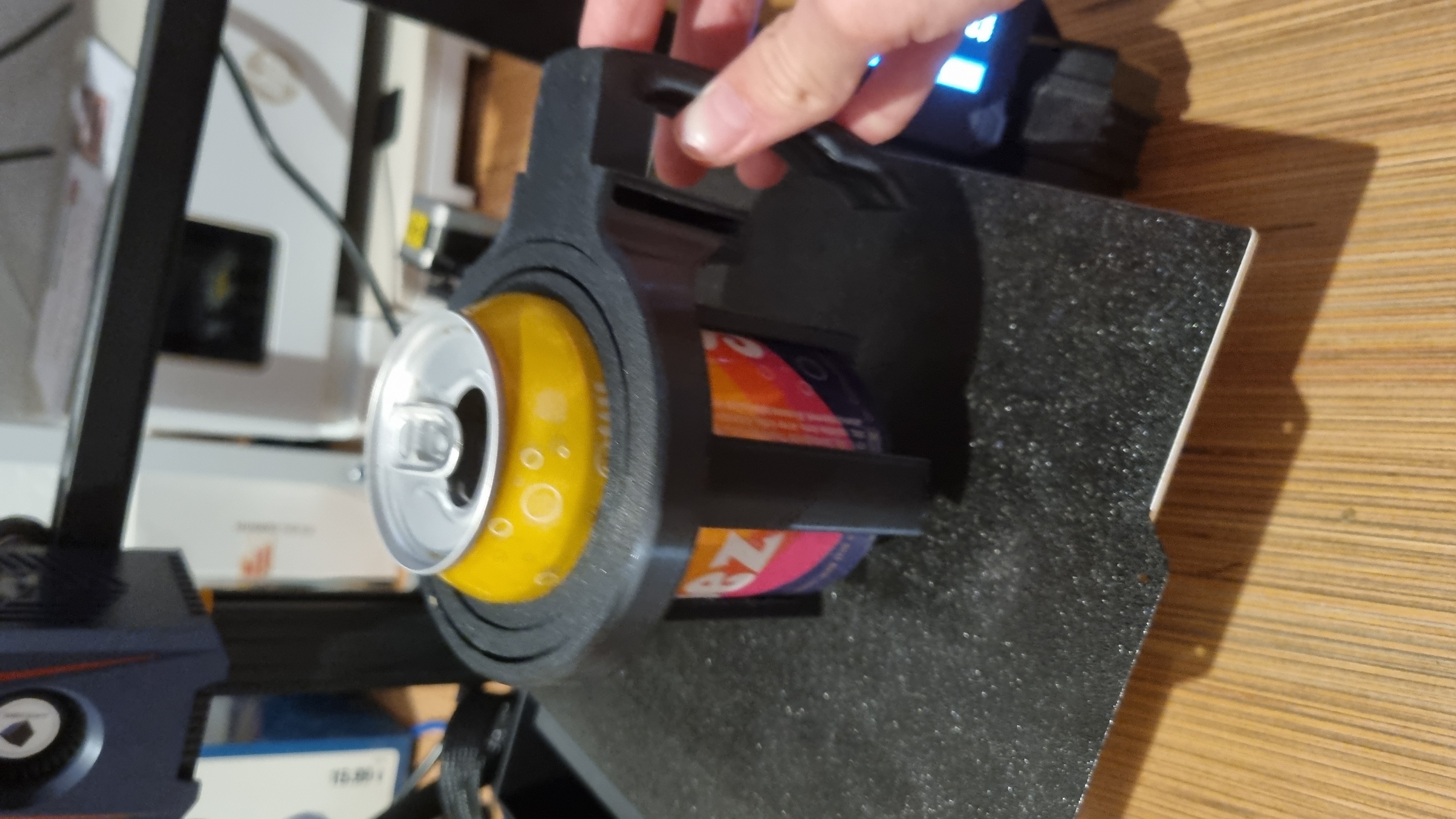 Gyroscopic can holder with a handle and a belt strap holder