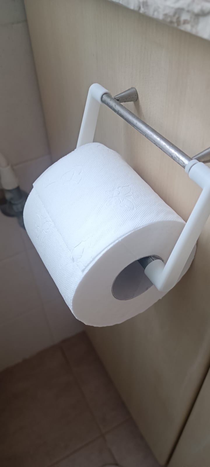 a very specific toilet paper holder