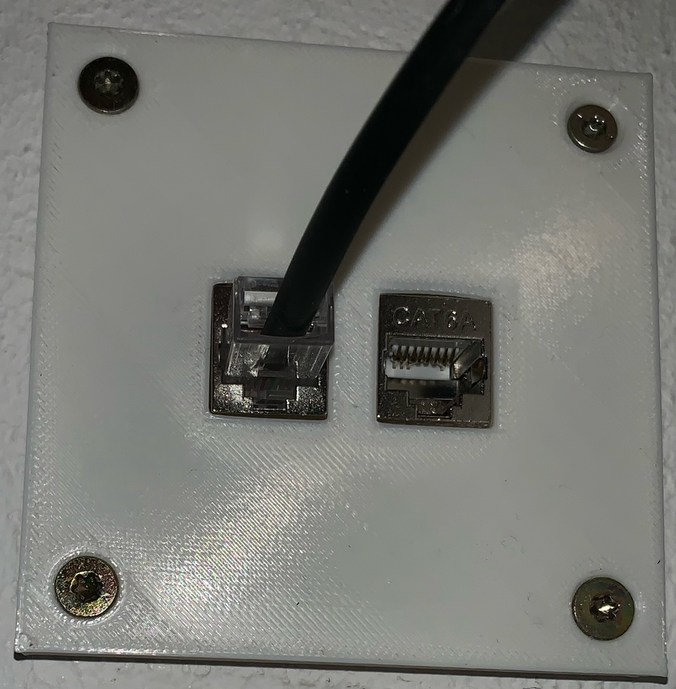 Simple keystone wall plate
