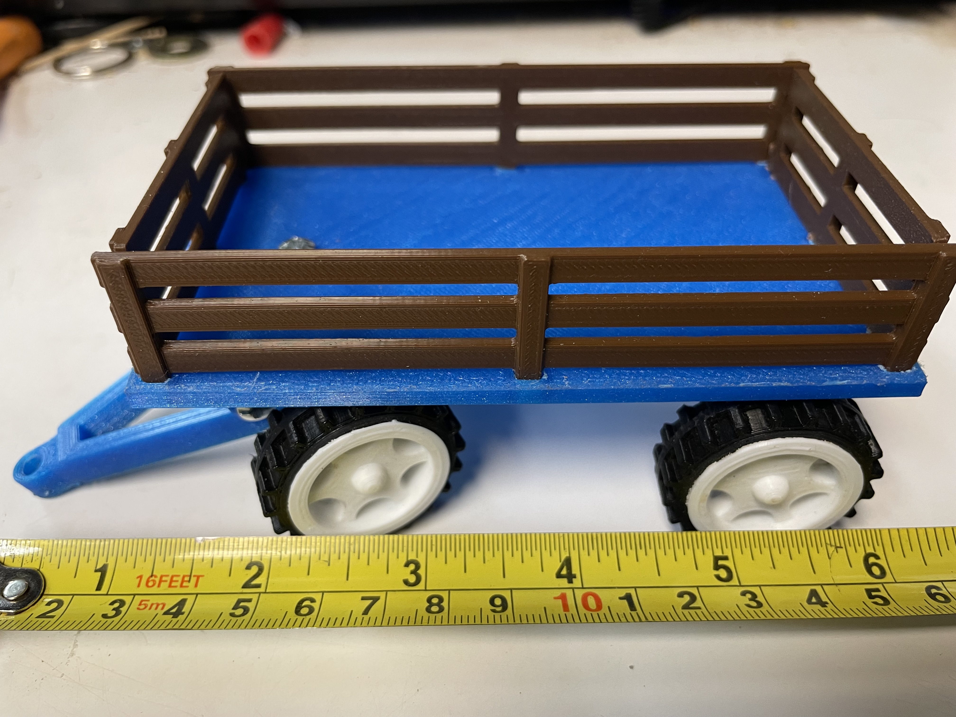 Trailer for a toy farm tractor