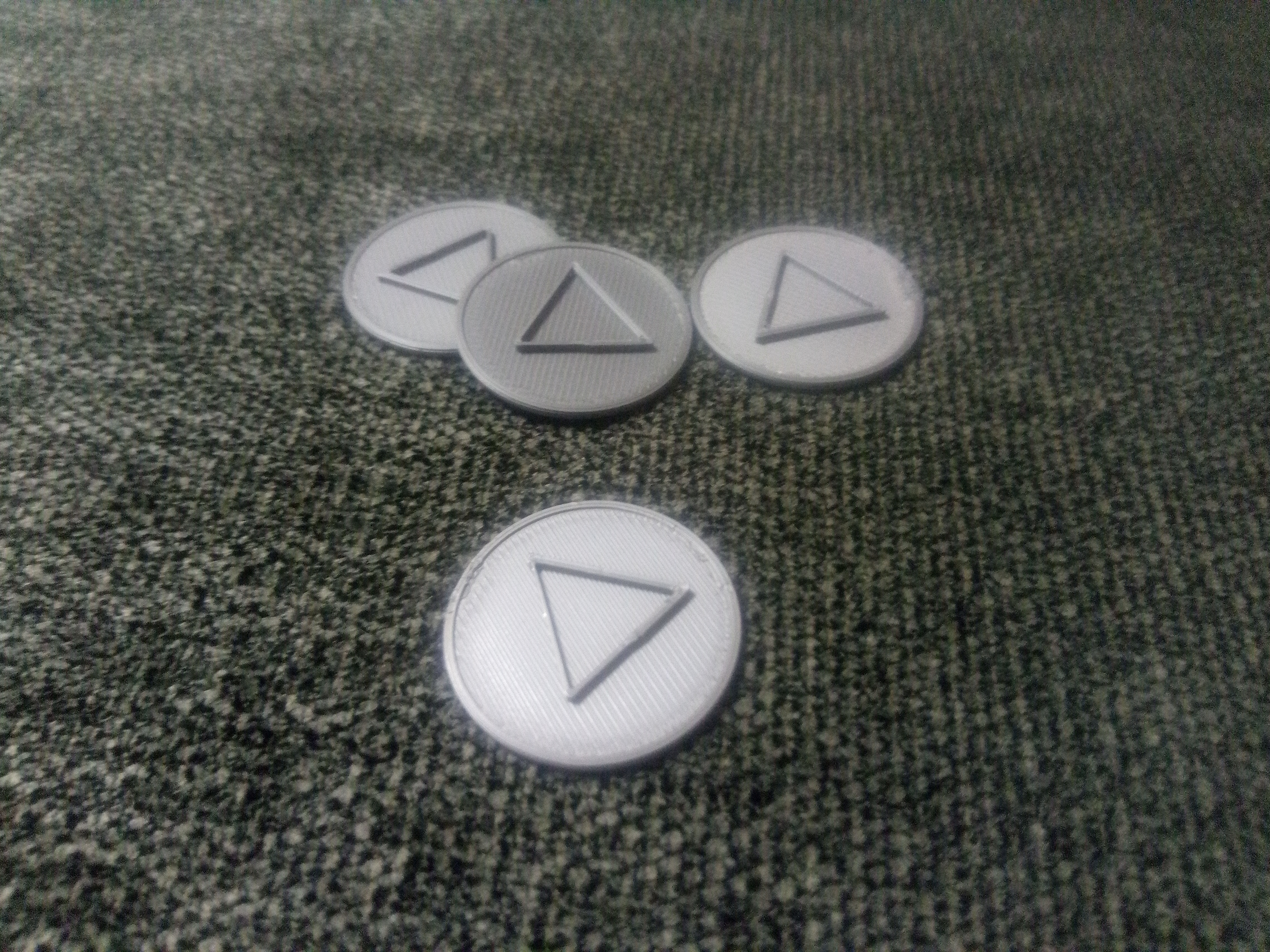 Token with a triangle