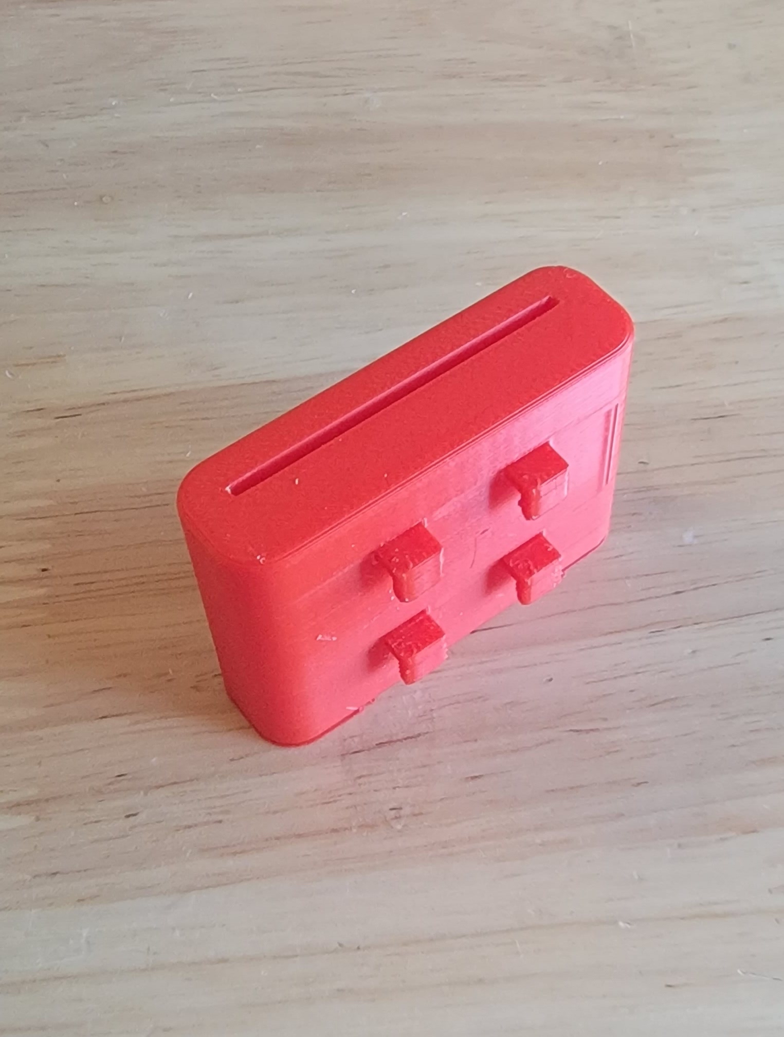 Scrapper holder to fit Bambu P1P Peg Board