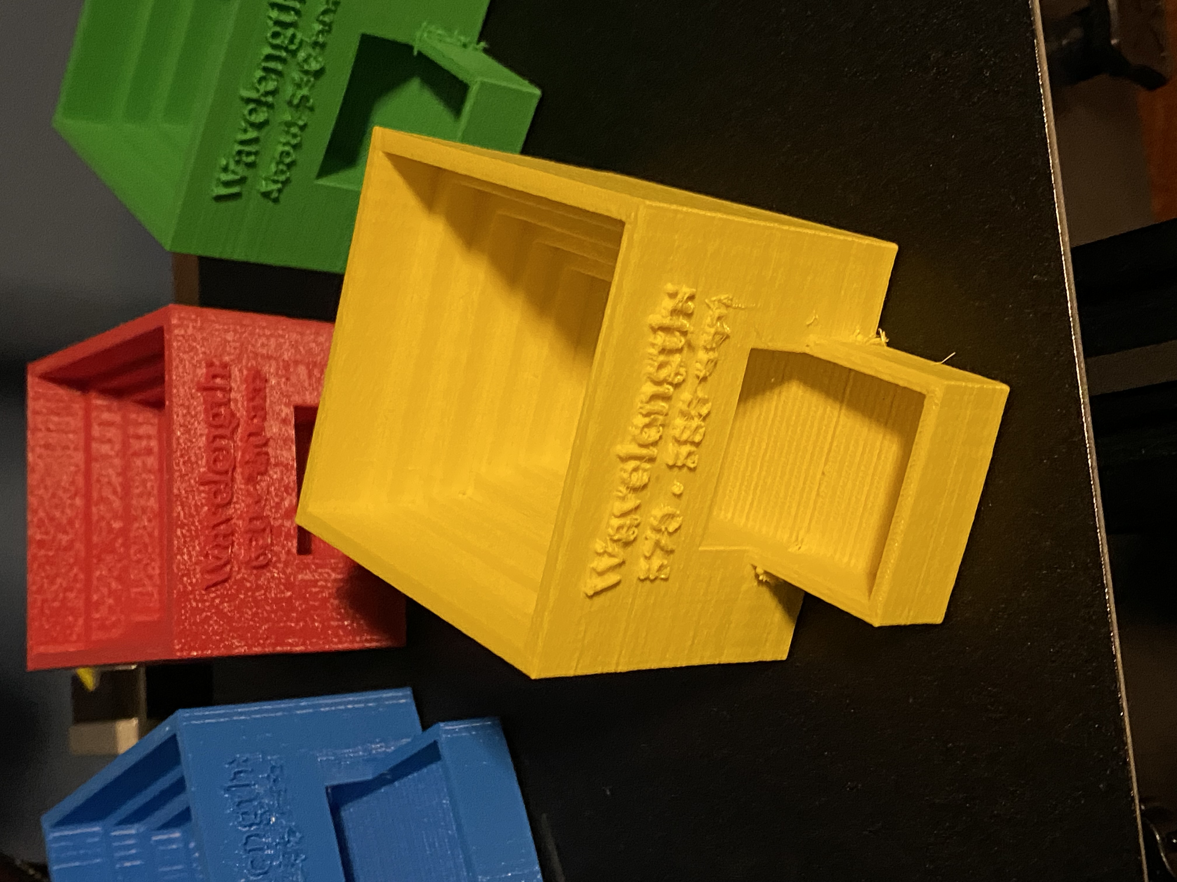 Yellow Lego EV3 color sorter cup