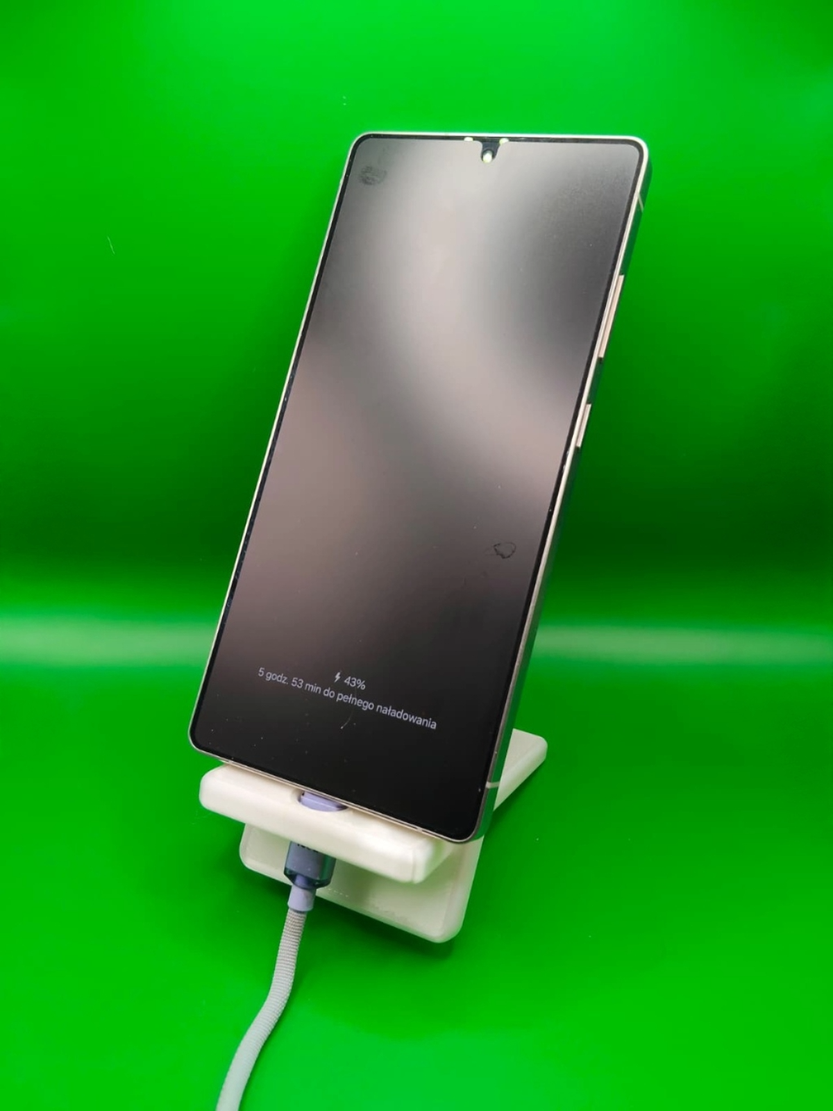 Flat-pack phone stand - charger friendly