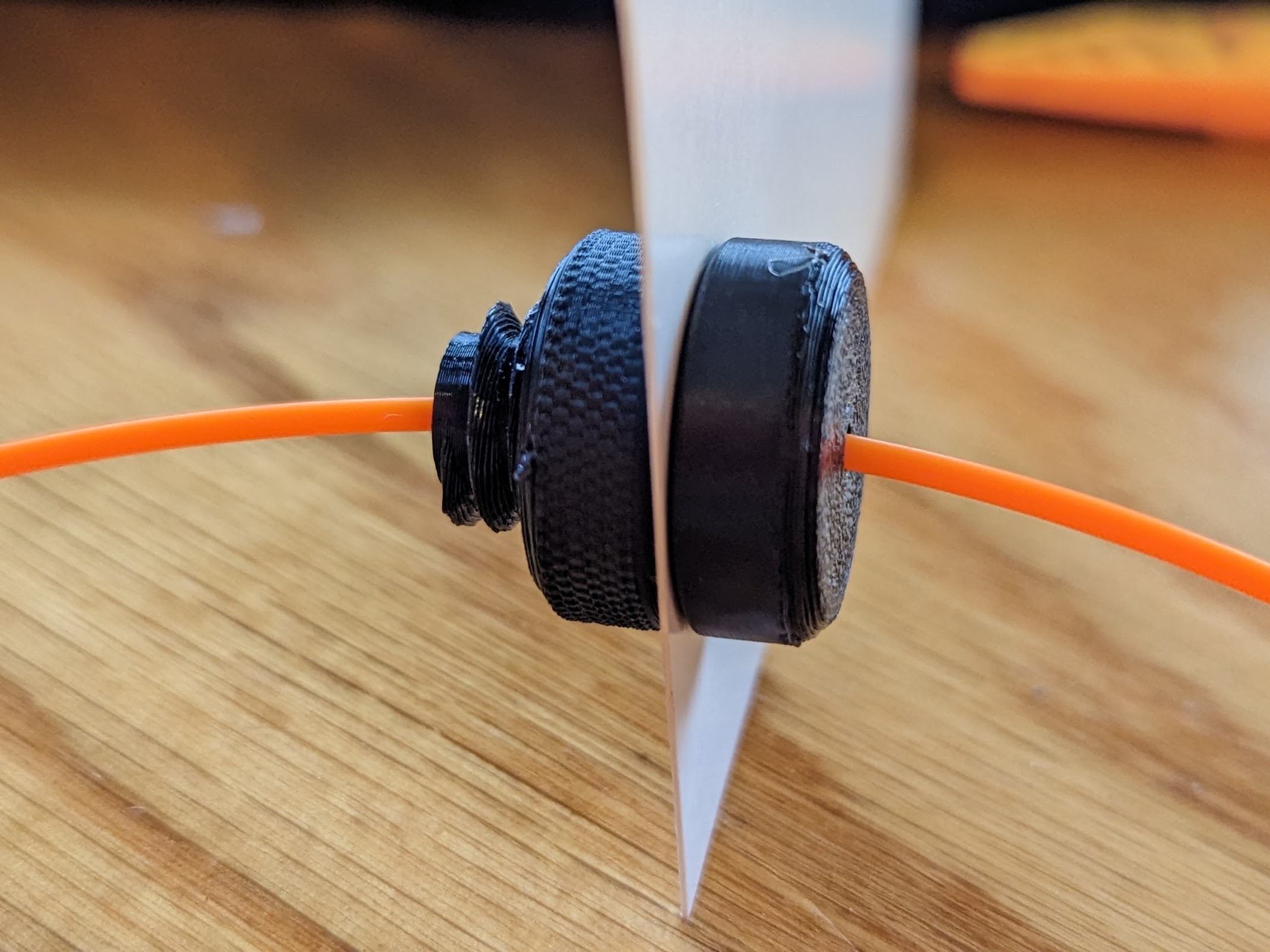 Simple filament pull-through bung/fitting with