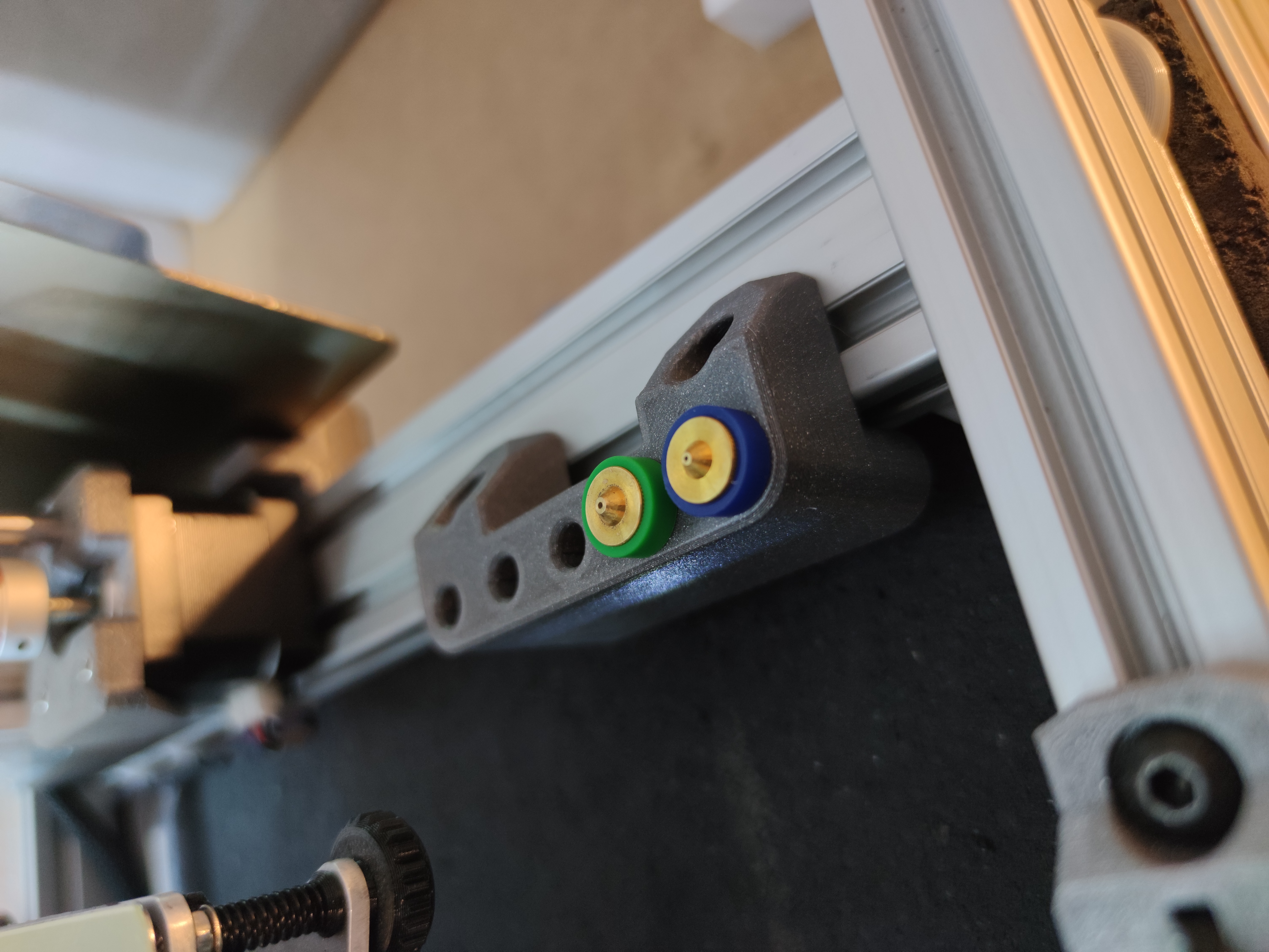 Nozzle holder for E3D Revo nozzles (parametric)