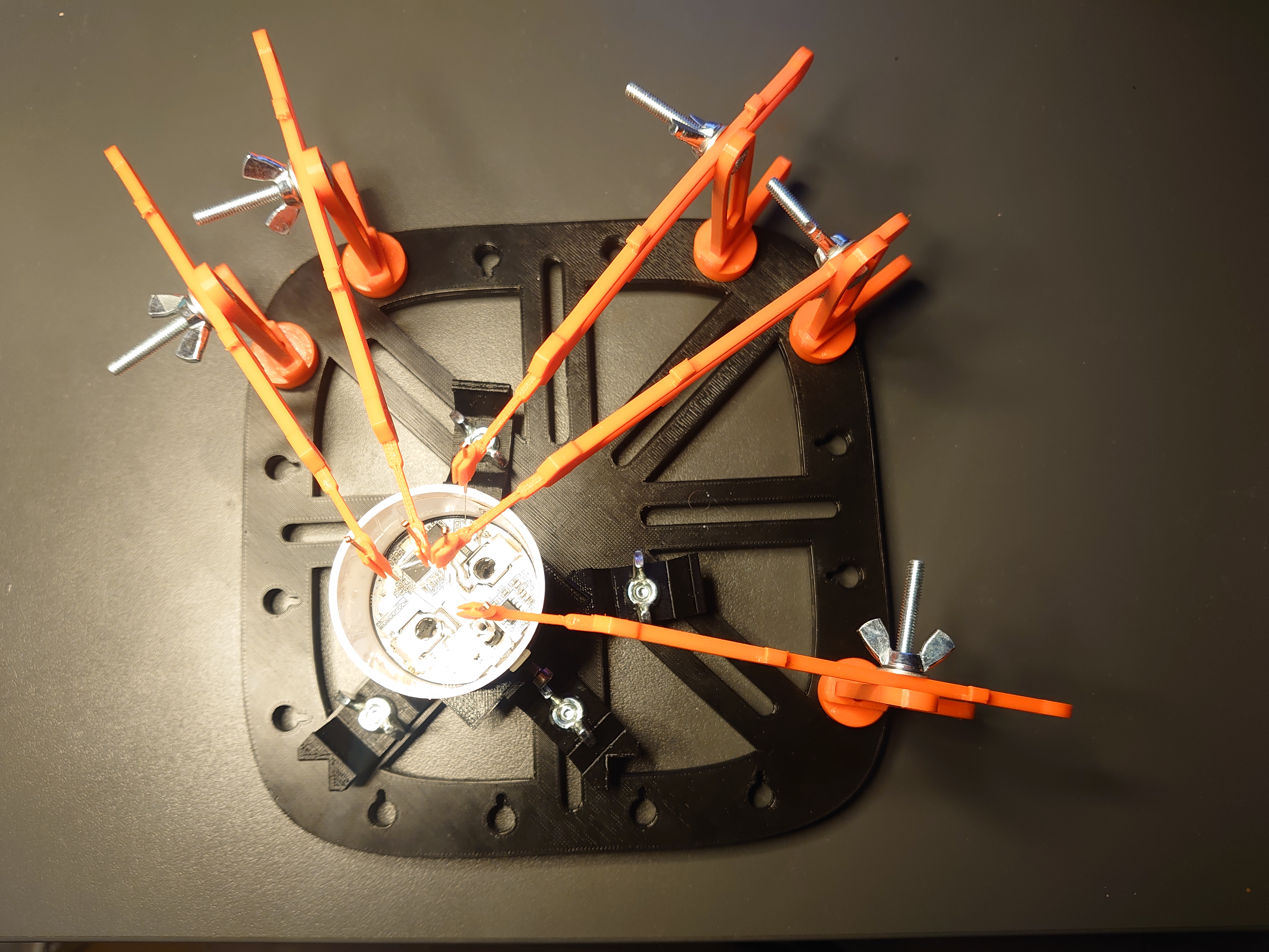 Electrical plug holder for PCB workstation